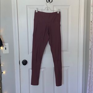 purple/pink high-waisted athletic leggings